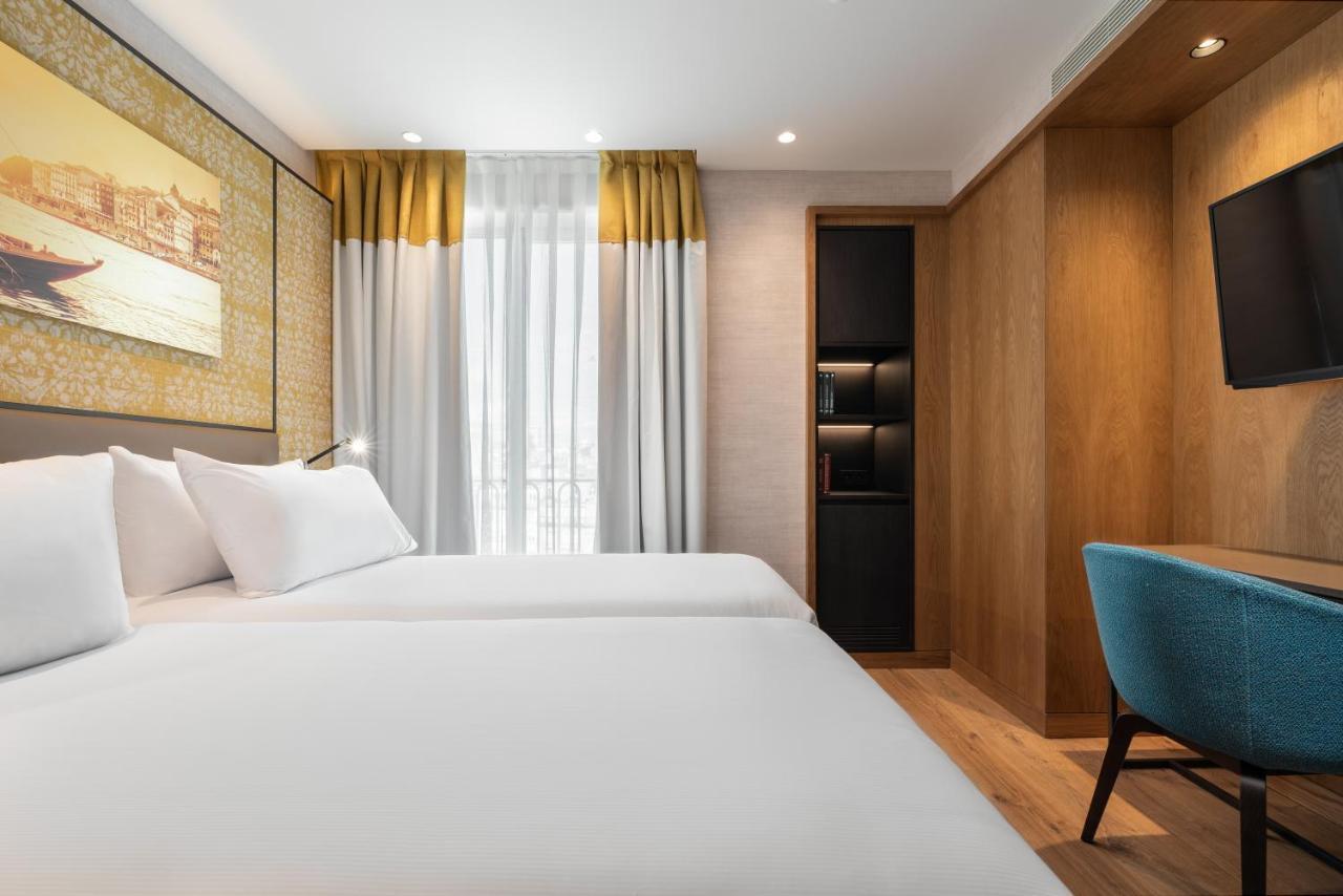 Hotel Eurostars Aliados Porto Exterior foto A room at the hotel