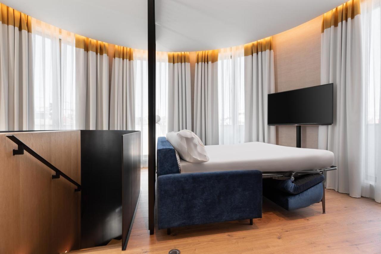 Hotel Eurostars Aliados Porto Exterior foto A sofa bed