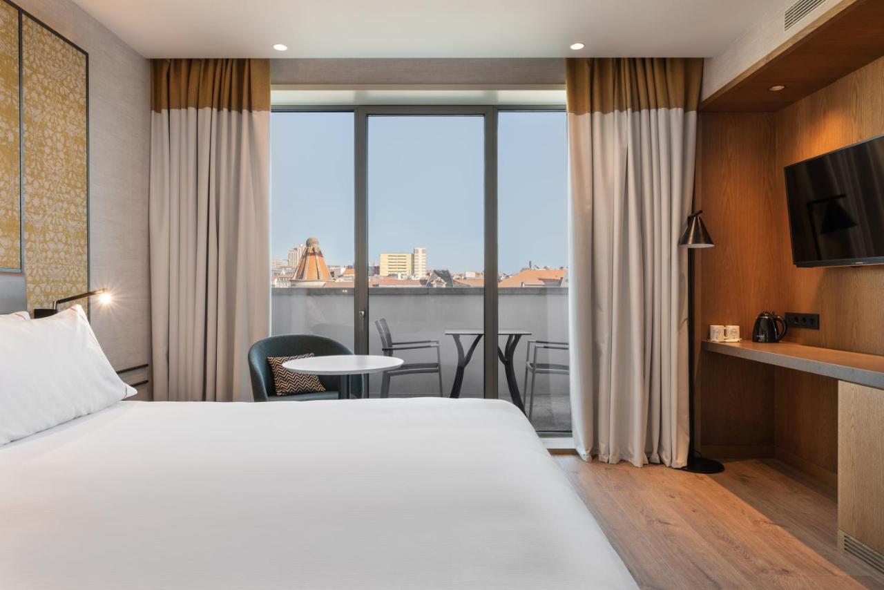 Hotel Eurostars Aliados Porto Exterior foto Deluxe room with balcony