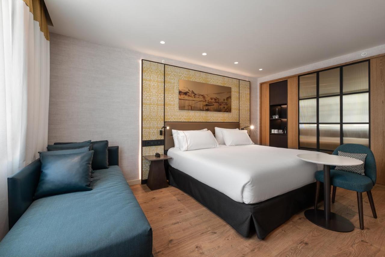 Hotel Eurostars Aliados Porto Exterior foto A room at the hotel
