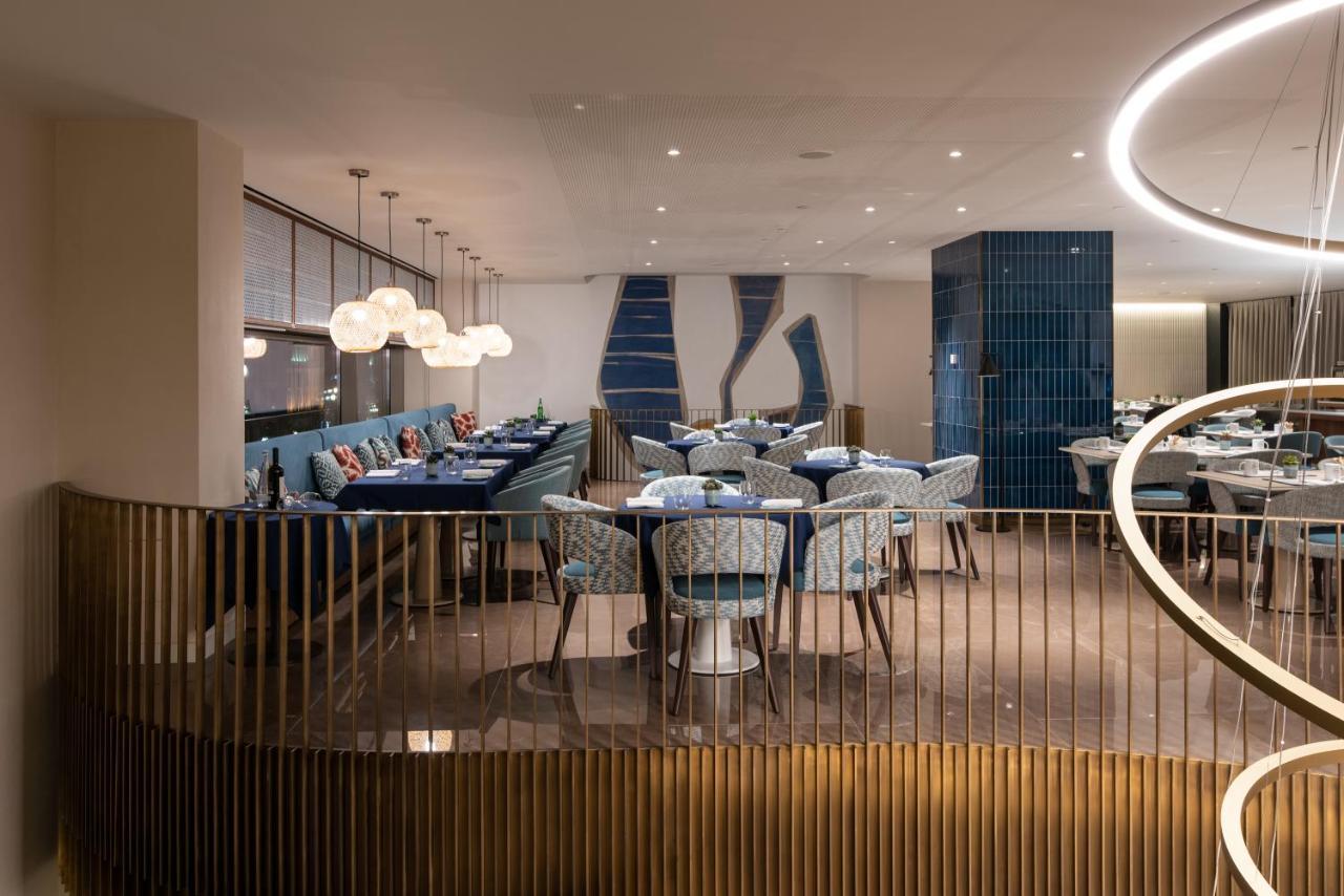 Hotel Eurostars Aliados Porto Exterior foto The interior of the restaurant
